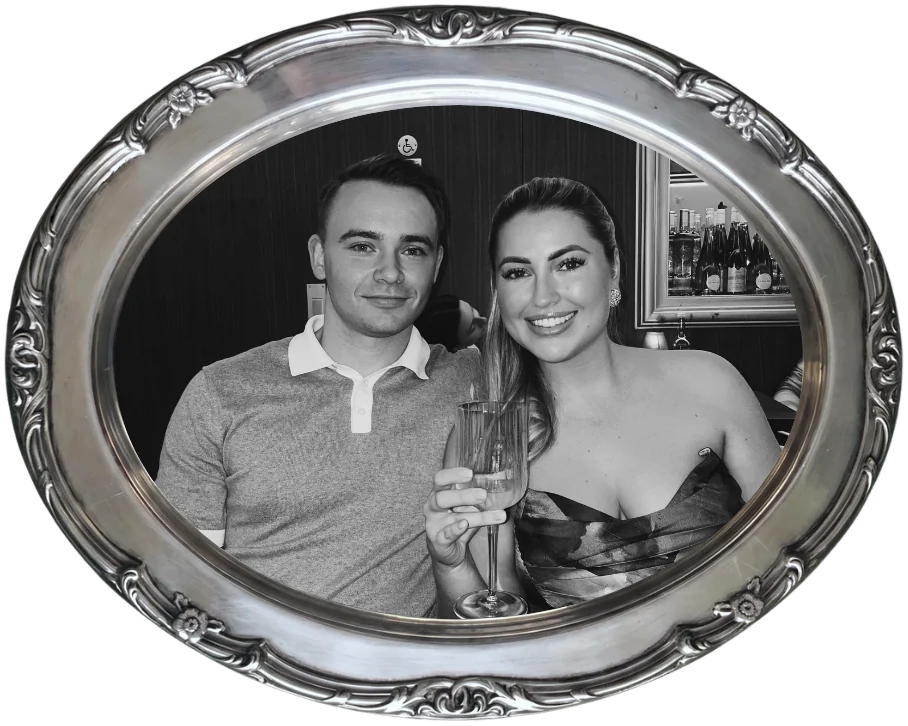 Jamie and Lewis in a silver oval frame